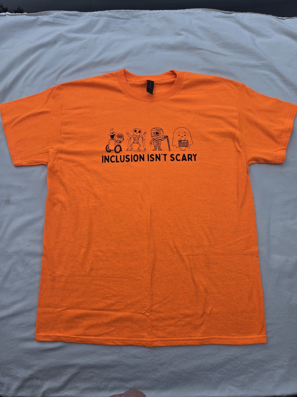 Inclusion Isn't Scary Graphic Tee - Orange
